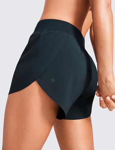 CRZ YOGA Women's Mid Waisted Running Shorts - Side Split Quick Dry Sports Gym Lightweight Bottoms with Liner True Navy 10 - Image 4