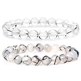 Bracelet d'Équilibrage des 7 Chakras et Diffuseur d'Huiles Essentielles : Ce bracelet est conçu pour harmoniser vos 7 chakras. La pierre de lave intégrée dans le bracelet peut absorber vos huiles essentielles préférées, les diffusant lentement pour en profiter tout au long de la journée. Atteignez l'équilibre et ressentez les effets apaisants des huiles essentielles avec ce bracelet.