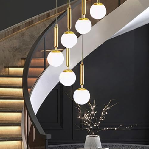 Suspension à 9 têtes Lumineuses en Verre, idéale pour Les Grands Salons. Design Minimaliste Moderne. Dimensions : 30 x 200 cm.