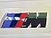 Produktbild Original BMW M Emblem Chrom Zeichen Logo für Seitenwand Kotflügel Silbrig glänzend für BMW E36 E46 E90 E91 E92 E93 F31 F36 E34 E39 E60 E61 E63 E64 E23 E32 E38 E31 I01 I12 E84 E83 E53 E70E85 E86 E89