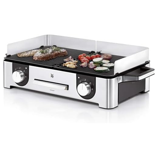 Outwell Crest Gas Grill 2022 Campingküche 5 WMF Lono Master-Grill, Elektrogrill, 50 x 28 cm, Tischgrill elektro mit Windschutz und Auffangschale, Outdoorzertifiziert für Barbecue, 2 getrennt regulierbare Grillflächen, 2400 W, edelstahl matt