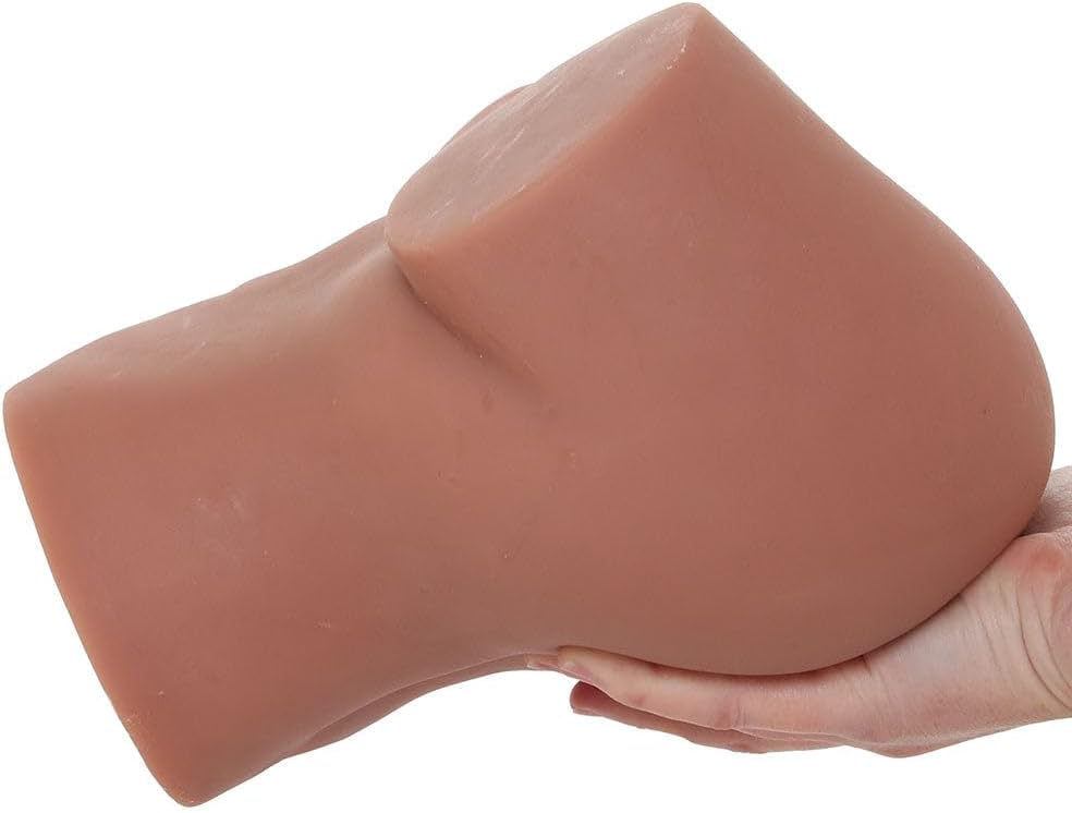 Side view of the PDX Elite Back That Ass Up Suction Masturbator held in a hand, illustrating its size.