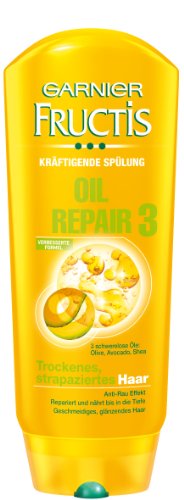 Preisvergleich Produktbild Garnier Fructis Haar Spülung Oil Repair / Conditioner für intensive Haarpflege (mit 3 Ölen: Oliven-, Avocado- und Shea-Nuss-Öl für trockenes und strapaziertes Haar) 3 x 200ml