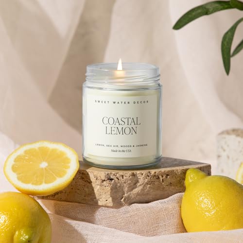 Image of Sweet Water Decor Coastal Lemon Candle, 9oz Clear Jar, Summer Scent | Lemon, Sea Salt & Driftwood Scented Soy Wax Candle, Gold Lid, 40+ Hour Burn Time, Coastal Home Decor, Summer Gift