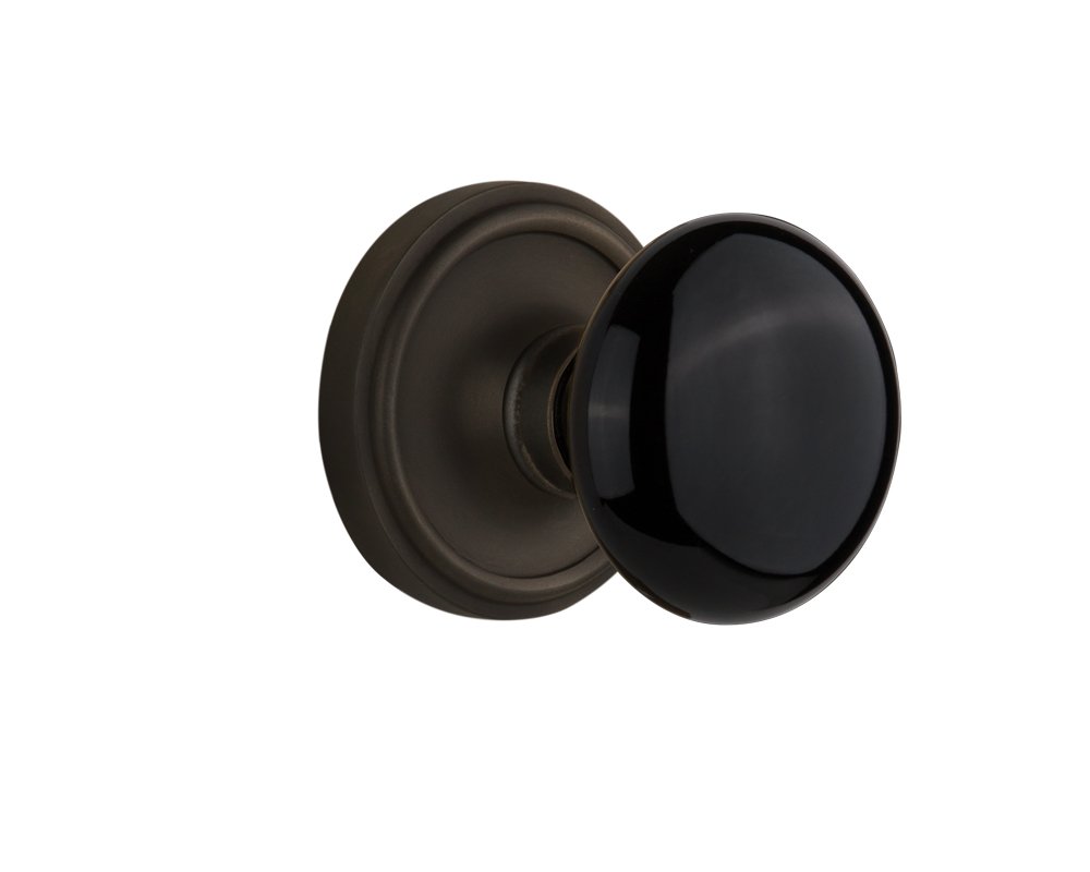Nostalgic Warehouse Classic Rosette with Black Porcelain Door Knob, Passage - 2.375", Oil-Rubbed Bronze