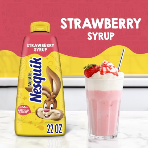 Image of Nesquik Strawberry Flavored Syrup, 22 Oz | Strawberry syrup for milk or ice cream; 22 oz plastic bottle