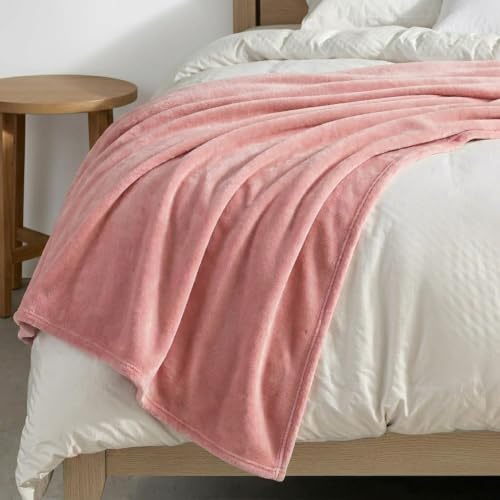 Image of Martha Stewart - Twin Size Blanket, Ultra-Soft Plush Fleece Throw Blanket with Double-Needle Stitching, 350 GSM, Medium Weight Bedding for Bed or Couch (Bedford Solid Pink)