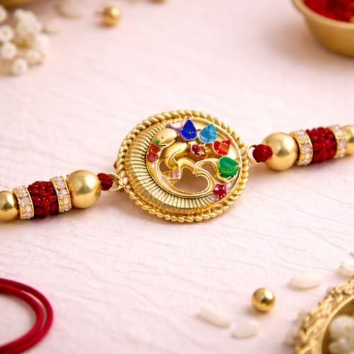 Image of JAIPUR ACE Designer Gold Plated Om Rakhi with Multicolor Stones - Premium Raksha Bandhan Thread for Brother, Elegant Ganesha Rakhi with Red String, Beads & Festive Traditional Finish (Golden Om rakhi)