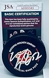 MacKenzie Weegar signed Calgary Flames Official Game Puck autographed JSA - Autographed NHL Pucks