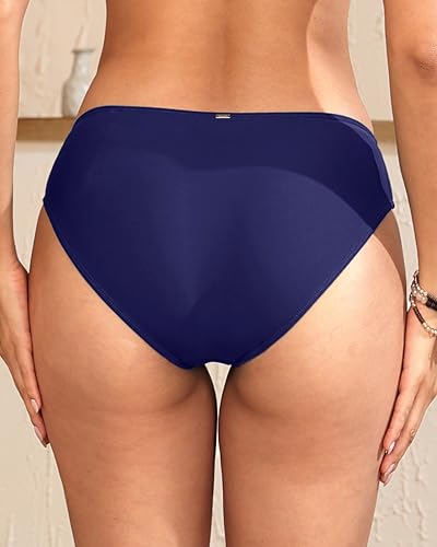Image of Daci Women's Mid-Rise Full-Coverage Bikini Bottom | Mid-rise bikini bottom with full rear coverage in 82% nylon and 18% spandex for comfortable swimming and beachwear