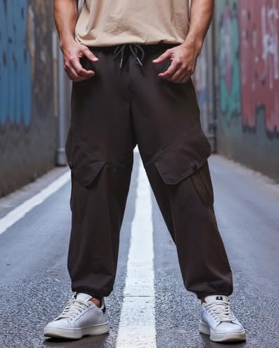 Image of Bewakoof Men's Cotton Super Loose Fit Joggers|Bewakoof Air 1.0 | Track pants for man | Lower for man | Trouser for men | Baggy trackpants for men | Multipurpose | Mens Lower Activewear | Utility Pockets | Lightweight & Flexible Elastic Waist | Casual Joggers | Loose Fit