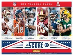 400 Card NFL Football Gift Set including cards from the past 10 years including a bonus factory sealed pack of 2014 Score NFL Stickers - w/ Superstars, Hall of Fame Players, and many Rookie Cards that span last 25 years! Any football collector will enjoy the variety. Look for Favre, Peyton, Rodgers, Brady, Russell Wilson, Marino, Montana and more