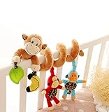 Baby wird von den bunten Kinderwagenspielzeugen angezogen und hat Spaß damit. So haben Sie Freizeit zum Kochen, Backen, Reinigen usw