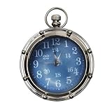 Adorable pequeño reloj - shell coloridas características hacen de este reloj alarma sobresale en una multitud.