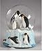 Penguin Family Musical Snow Globe - It's a Small World