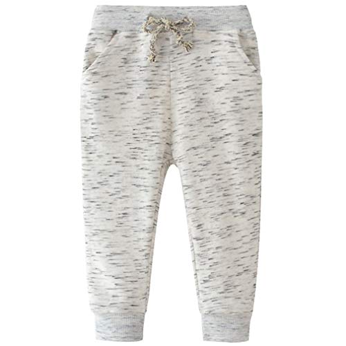 KISLOVE Jogging Enfant Garcon Imprimés et Couleurs Unies Jogging Sport Garçon,Point Blanc,5 Ans Cover