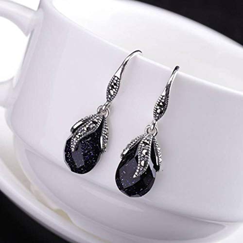 Boucles d'oreilles filles en argent et corindon rouge : le cadeau idéal