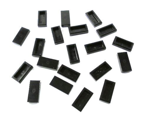 Preisvergleich Produktbild 20 Stück LEGO "Fliese 1x2 Noppen" in Schwarz.