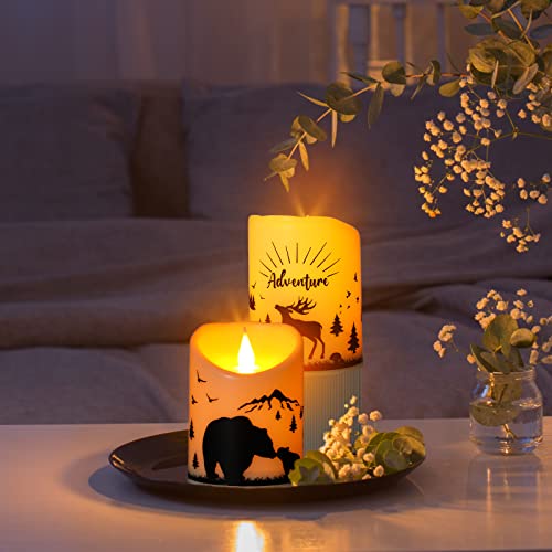 Image of Treela 2 Pieces Christmas Flameless LED Candles with 8h Timer, Battery Operated Plastic Pillar Rustic Candles Warm Light with Decals for Adventure Table Home Decor, D3 x H6 (Woodland Mountain)
