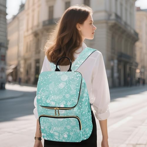 Mochila antirrobo mujer turquesa de viaje con pompón para escapadas urbanas 6