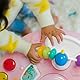 Bright Starts, Around We Go Tropic Coral 2-in-1 Spielstation & Lauflernwagen, Spieletisch mit Lichtern & Musik, 10 Aktivität Spielzeug, motorische Entwicklung, rosa, ab 6 Monaten