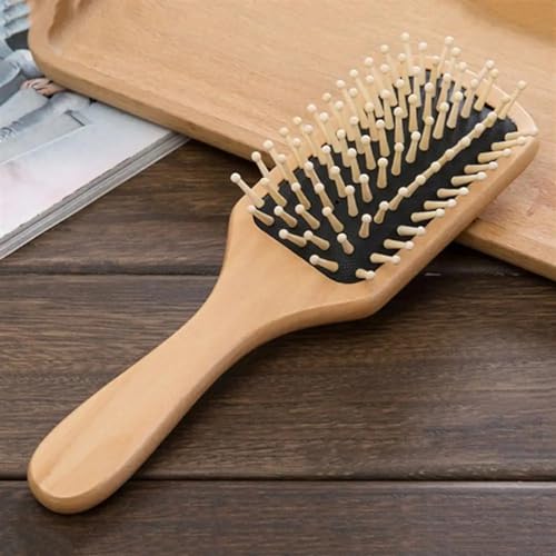 Peigne de massage en bois bien-être et détente pour le cuir chevelu
