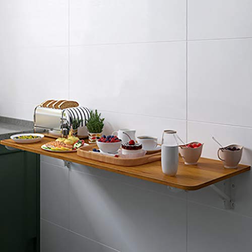 Tables à abattant pour petits espaces libérant la surface au sol