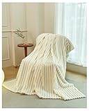 DESIGN RÉVERSIBLE POUR UNE UTILISATION VERSATILE: Ce plaid réversible vous permet de choisir entre deux textures différentes : une surface douce en fausse fourrure d’un côté et un tissu agréable et chaleureux de l'autre, pour un confort ultime et une utilisation facile.