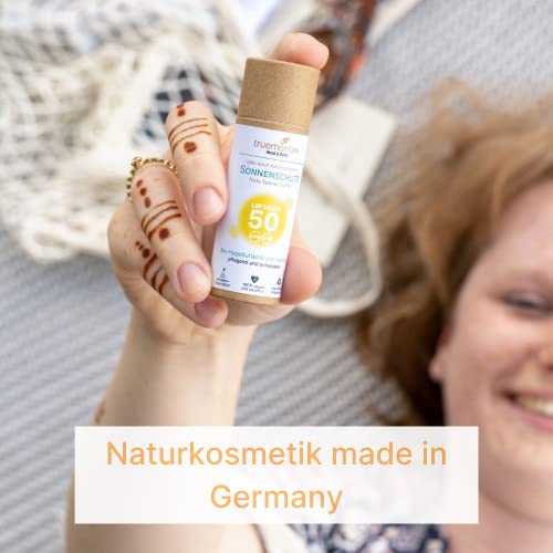 Foto von truemorrow Sonnenstick LSF 50 | feste Sonnencreme in Papierhülse | zertifizierte Naturkosmetik Made in Germany | plastikfreie vegane korallenfreundliche Creme | ideal für Gesicht Arme Dekolleté