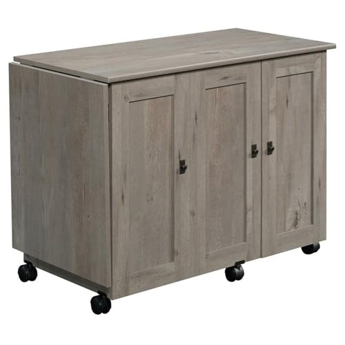 BOWERY HILL Contemporary Engineered Wood Sewing Craft Table with 2 Doors, 2 Storage Bins, Hidden Shelf, 2 Adjustable Shelves, Easy-Roll Casters, in Mystic Oak Finish