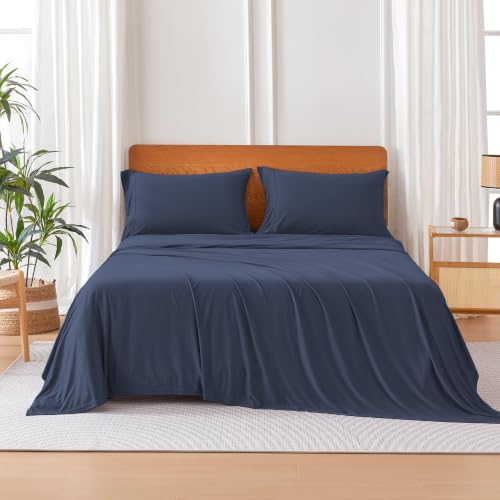 Image of Amazon Basics Jersey Knit 4-Piece Sheet Set, Wrinkle Resistant and Easy Fit, Includes 16 inch Deep Pocket Fitted Sheet, 1 Flat Sheet and 2 Pillowcases, King, Navy Blue