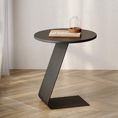 Mesa de centro pequeña para salones estrechos que soluciona la falta de espacio junto al sofá 4