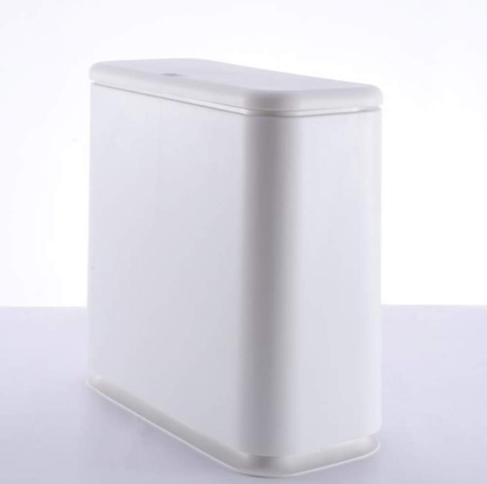 Toilette de salon avec poubelle d'égout pour un aménagement de studio réussi