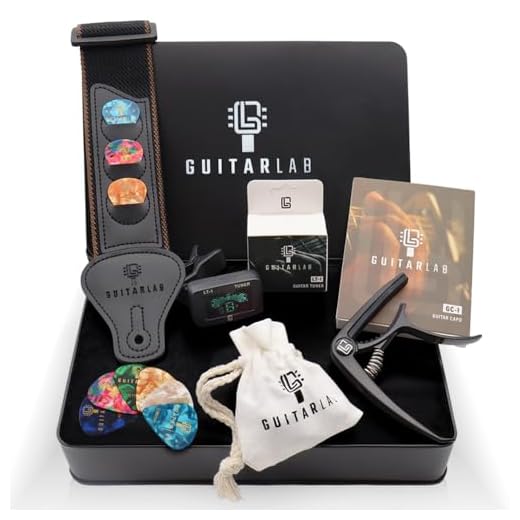 Guitar Lab Kit de accesorios para guitarra – Caja metálica resistente con correa, capodastro, afinador electrónico con clip y púas - Idea de regalo