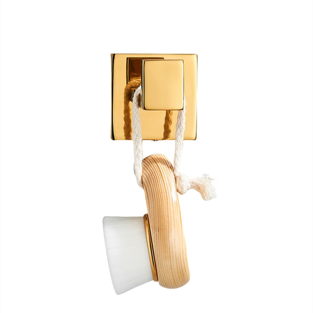 Set de accesorios de baño dorados en acero inoxidable para organizar un aseo moderno