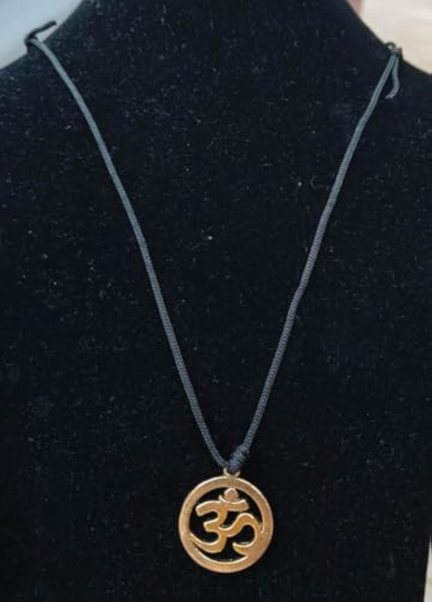 Unisex Adjustable Golden Om Locket Pendant on Black Thread