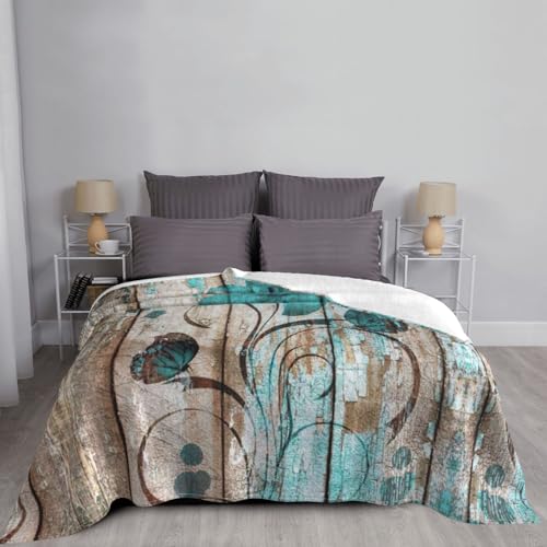 Couverture flanelle fleur sarcelle pour soiree cocooning canape