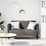 El llamativo diseño de pana y reposabrazos de madera contrachapada combina diferentes elementos de estilo y se adapta tanto a interiores modernos como tradicionales.