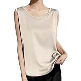 Il fascino discreto del raso Sperimenta la sensazione lussuosa di questa canotta donna elegante in puro raso. La trama liscia e fluida del tessuto accarezza la pelle, donando un comfort eccezionale e una lucentezza sofisticata che cattura lo sguardo senza essere eccessiva.