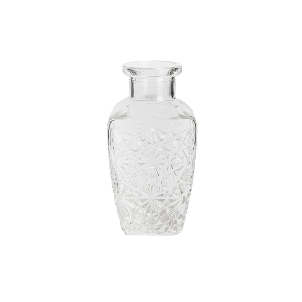 Vase en verre rétro cristal pour capturer la poésie d'une fleur unique
