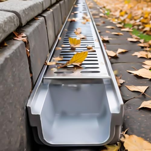 Scarico da trincea con griglia in metallo per doccia in cemento e drenaggio a pavimento del garage, canale durevole