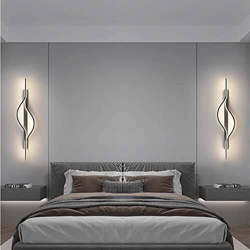 Aplique de pared junto a la cama negro con acabado metálico premium 3