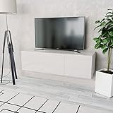 [Design moderne] Ce meuble TV contemporain présente une finition blanche élégante et brillante, ajoutant une touche de charme à la décoration de votre salon ou de votre chambre.