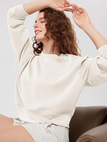 Image of ODODOS Modal Soft Long Sleeve Cropped Sweatshirts for Women Oversized Crew Neck Pullover Crop Top