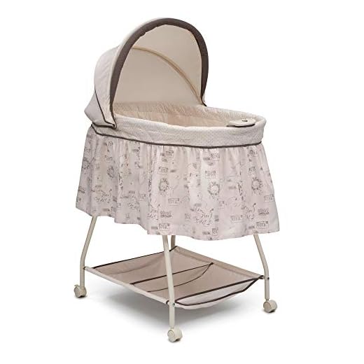Delta Children Deluxe Sweet Beginnings Bedside Bassinet - Portable Crib with Lights and Sounds, Playtime Jungle