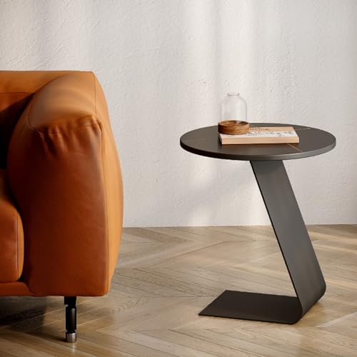 Mesa de centro pequeña para salones estrechos que soluciona la falta de espacio junto al sofá 3