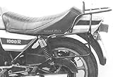Der HEPCO & BECKER Komplettträger bestehend aus Seitenkofferträger und Rohrgepäckbrücke wird fest am Motorrad verschraubt und kann nur zusammen montiert werden. Dieser Träger bietet die Möglichkeit alle HEPCO & BECKER Seitenkoffer zu montieren. Auf die Rohrgepäckbrücke können fast alle Topcases aus unserem Haus montiert werden. (Orbit Topcase und Topcases mit Universal Kunststoffplatte passen nicht) Die Seitenkoffer werden mittels eines Halteschlosses am Träger abgeschlossen. Die dazu benötigten