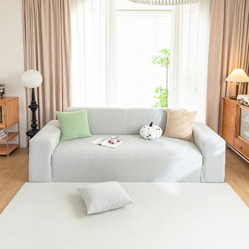 Housse de canapé extensible pour rénover un fauteuil usé - 2