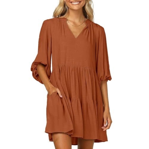Robe col en V à manches bouffantes aux finitions soignées