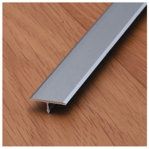Seuil de transition bois vers carrelage pour harmoniser les sols de la maison